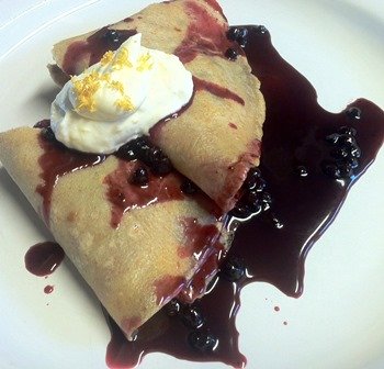 Blueberry Crepes with homemade ricotta cream and lemon zest.