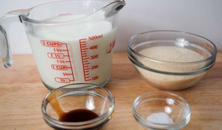 Ingredients for dulce de leche: milk, sugar, vanilla, and baking soda.