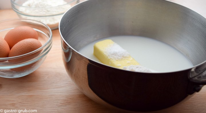 For the pastry shells combine the milk, water, butter, sugar, and salt in a 2-1/2 quart saucier.