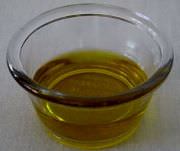 Extra virgin olive oil in a ramekin.