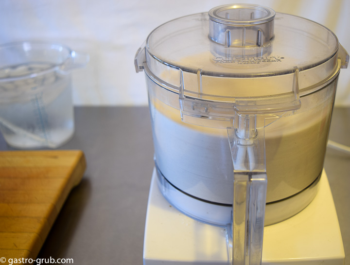 Flour, sugar, and salt in a food processor.