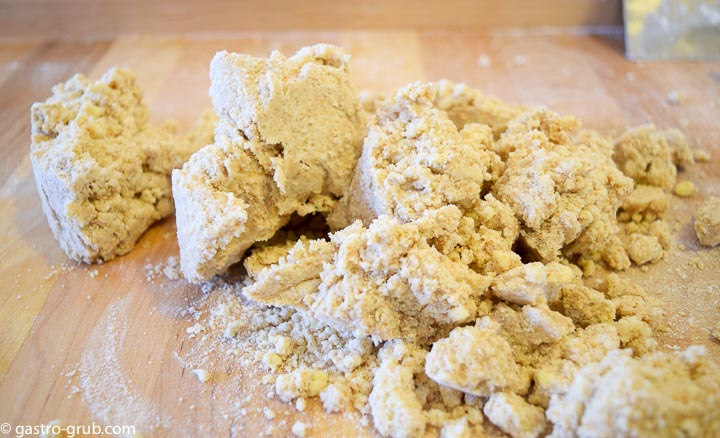 Pie dough on a cutting board.