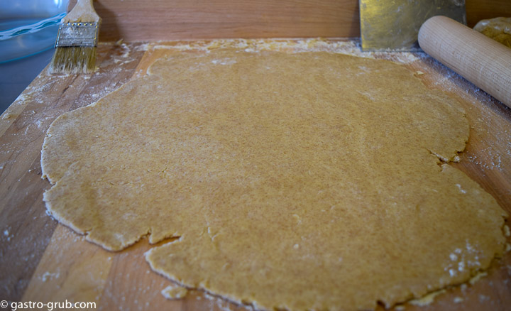 Pie dough being rolled out.